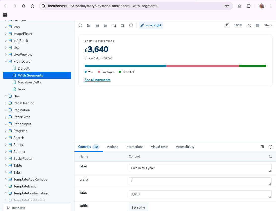 Storybook running the Keystone design system: the MetricCard component with a segmented bar for you, your employer and tax relief.