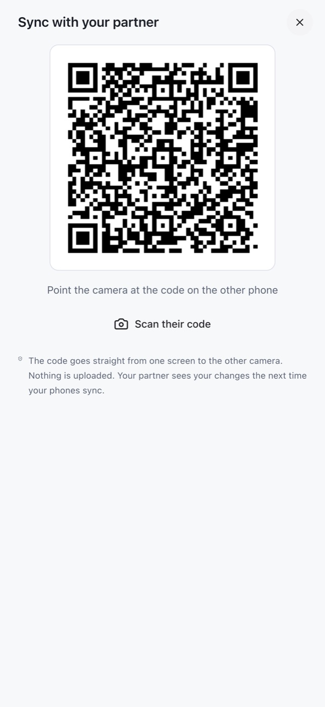 Syncing two phones by scanning a QR code.